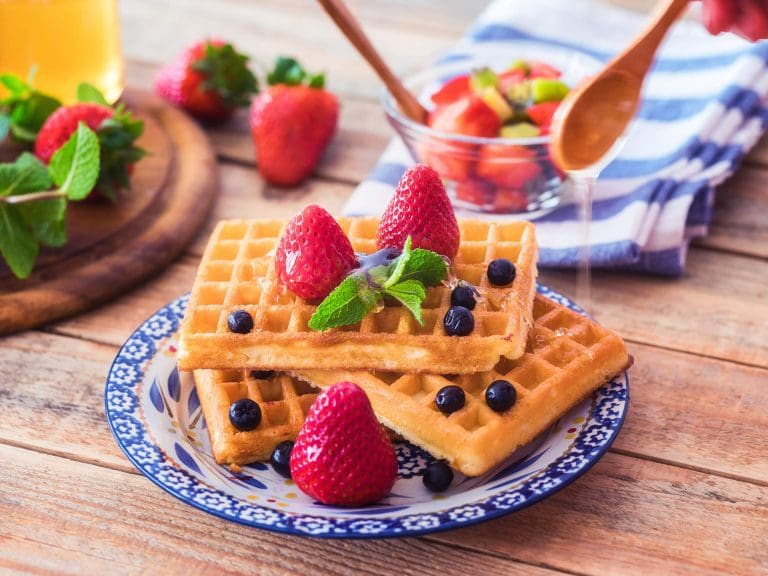 images of waffles with strawberries and raisins